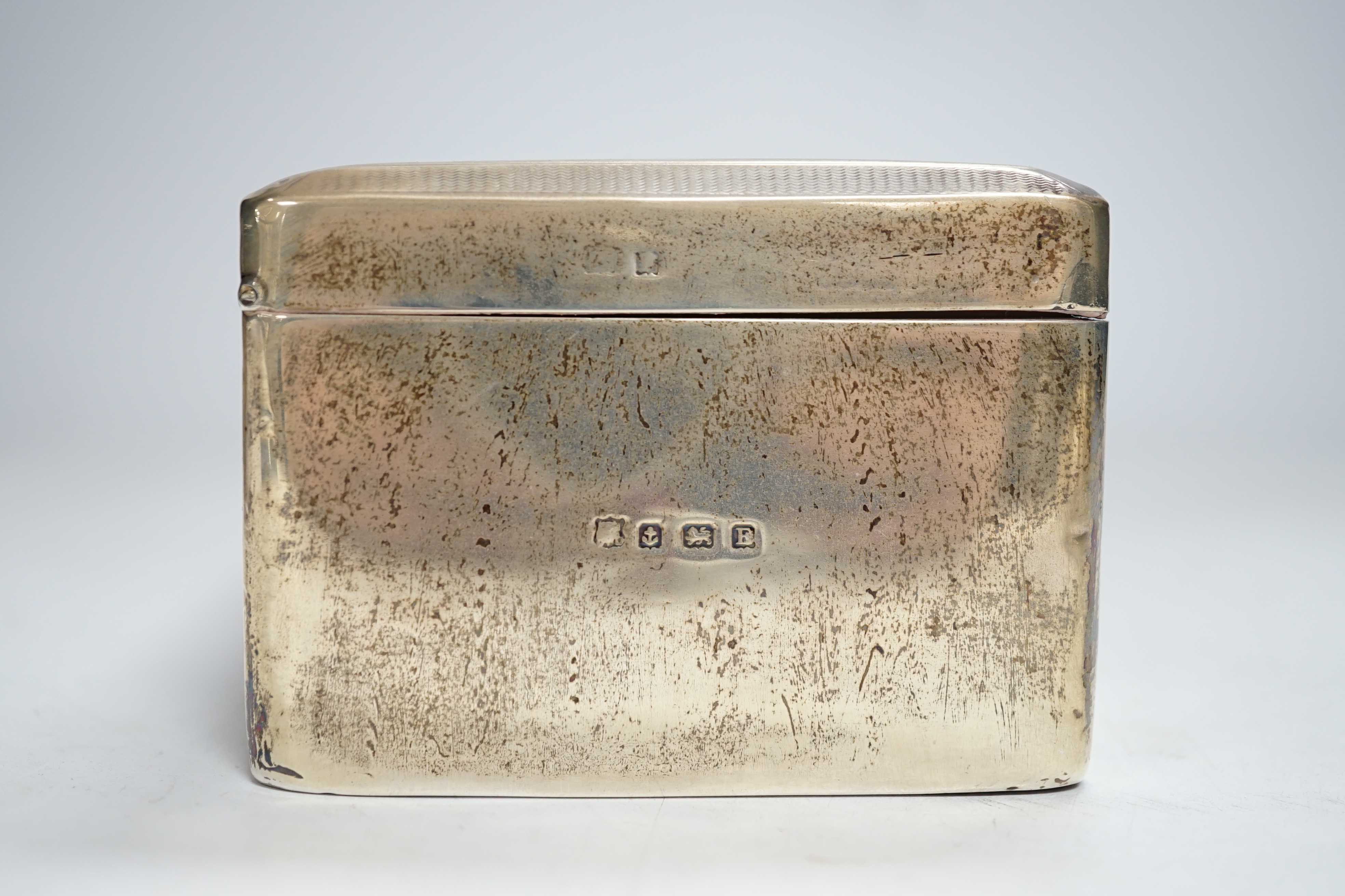 A George V Art Deco silver mounted rectangular cigarette box, Birmingham, 1930?, 17.5cm.
